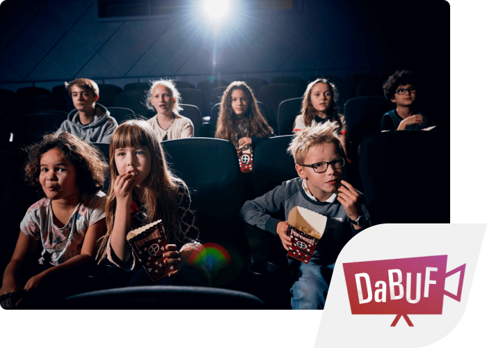 Children watching a film and eating popcorn in a dark cinema. The DaBUF logo is inset in the corner.